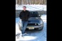 Tom Moloughney and his Mini E