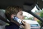 Female Motorist - On her Cell Phone
