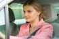 Female Motorist - Checking out her Surroundings