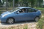 Alison McKellar of DeLand, Florida, pictured with her 2007 Toyota Prius