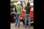 Women Videotaping a Truck
