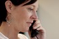 Cautious Woman on Phone